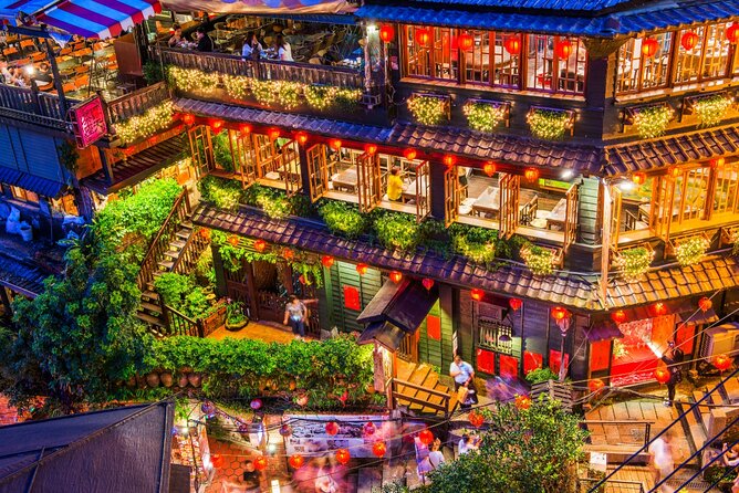 7-Hour Jiufen Night View, Shifen Waterfall & Raohe Market Tour - Jiufen after dark: food, tea, stairs, and old lanes